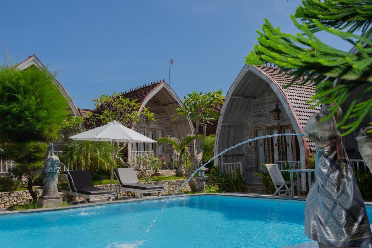 Hotel The Mel Huts à Batununggul Extérieur photo