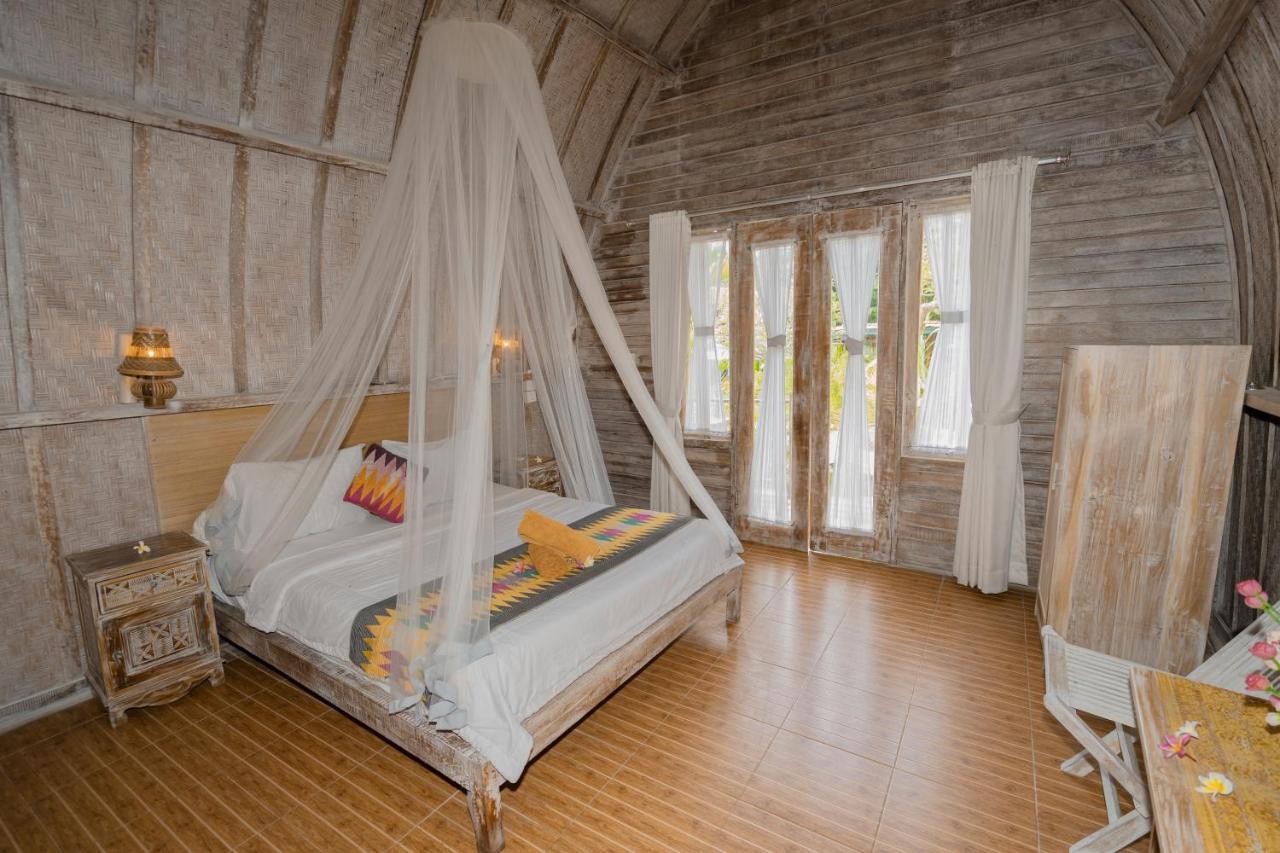 Hotel The Mel Huts à Batununggul Extérieur photo