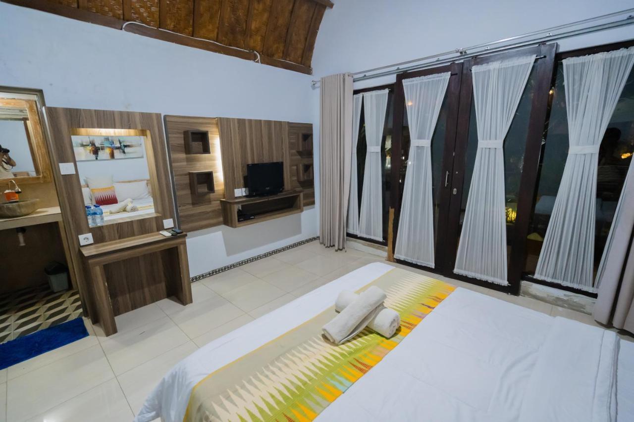 Hotel The Mel Huts à Batununggul Extérieur photo