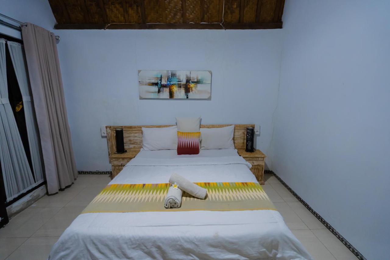 Hotel The Mel Huts à Batununggul Extérieur photo